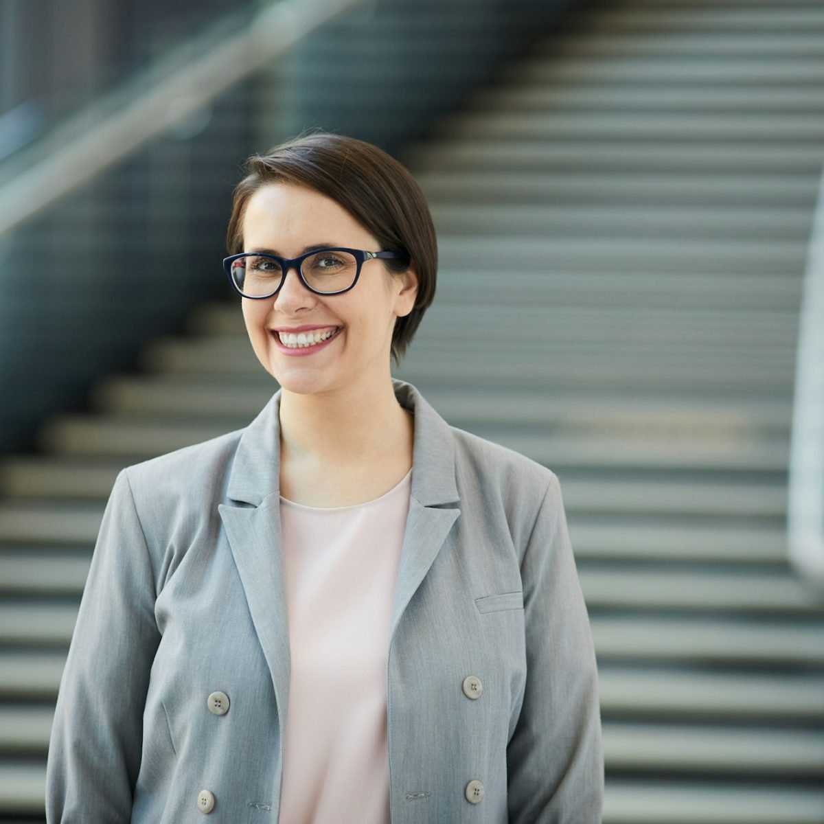 Cheerful project manager in lobby